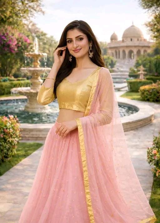 Women's pink semi stitched lehenga choli with golden blouse