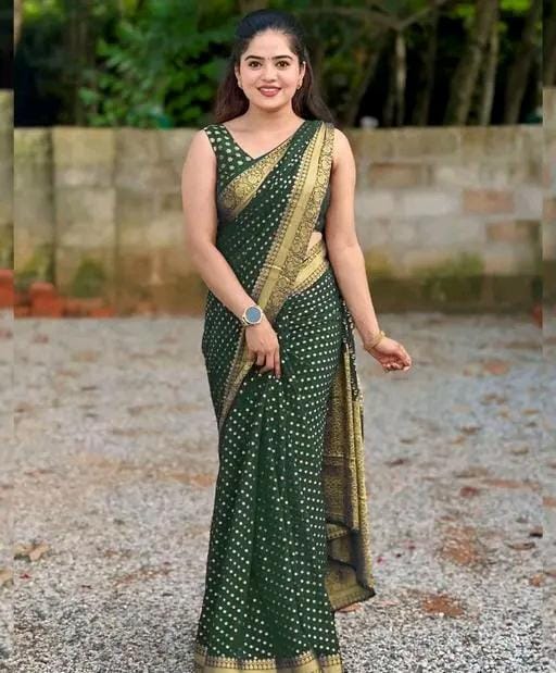 Designer jacquard saree with golden zari blouse