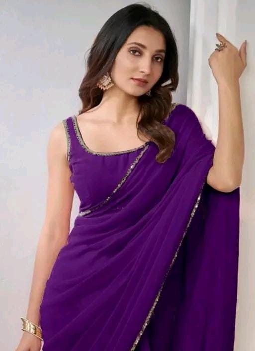 Women stylish pink colour plain pure fox georgette fabrics saree