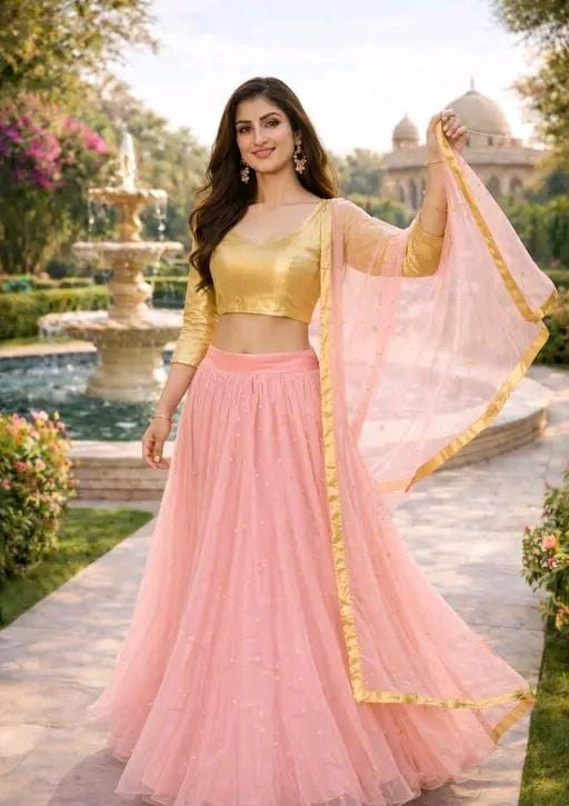 Women's pink semi stitched lehenga choli with golden blouse