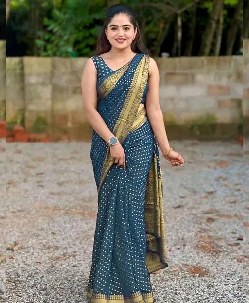 Designer jacquard saree with golden zari blouse