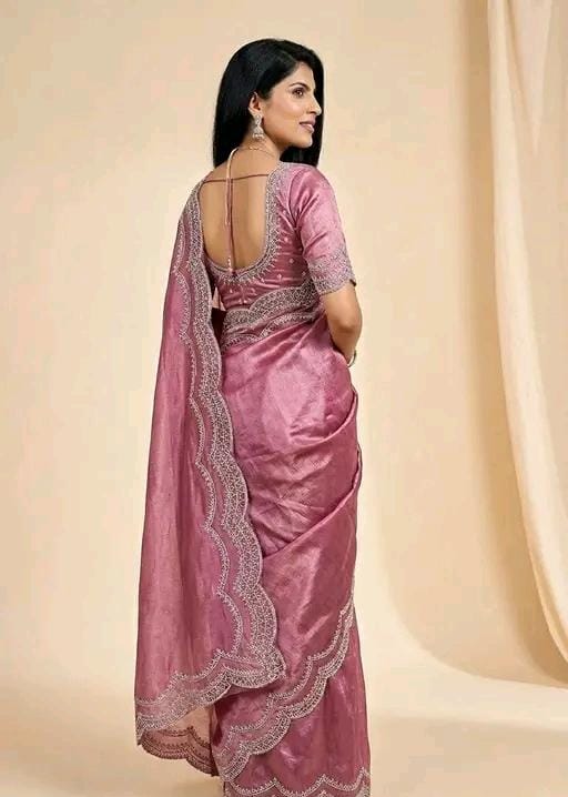 Wine pinkvsoft silk sareewith silver stone work border & designer blouse