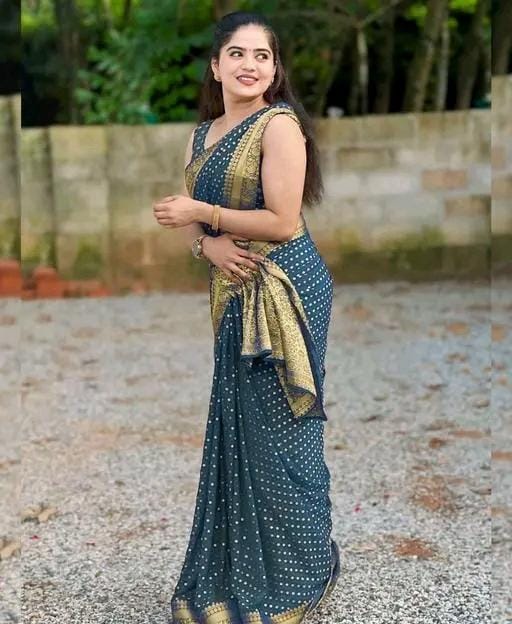 Designer jacquard saree with golden zari blouse