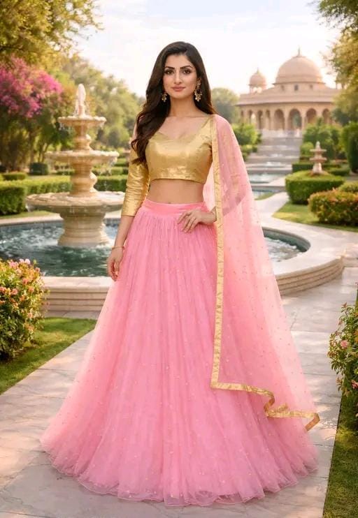Women's pink semi stitched lehenga choli with golden blouse