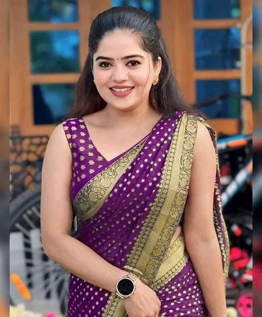 Designer jacquard saree with golden zari blouse