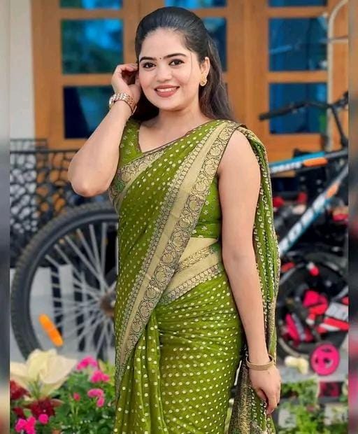 Designer jacquard saree with golden zari blouse