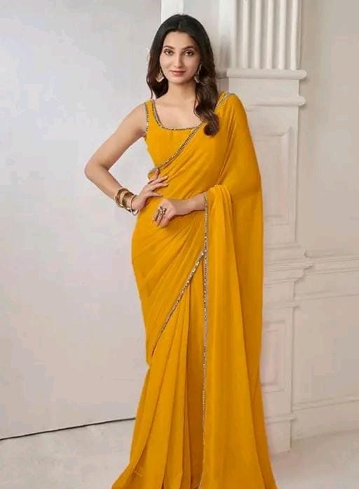 Women stylish pink colour plain pure fox georgette fabrics saree