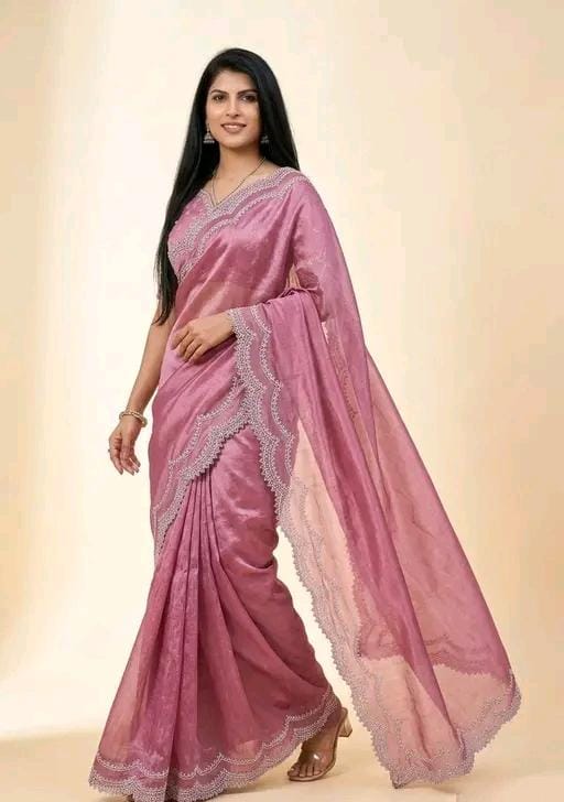 Wine pinkvsoft silk sareewith silver stone work border & designer blouse