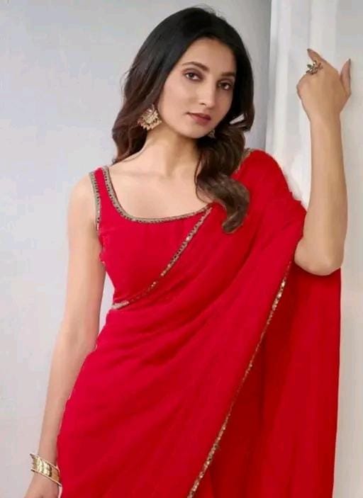 Women stylish pink colour plain pure fox georgette fabrics saree