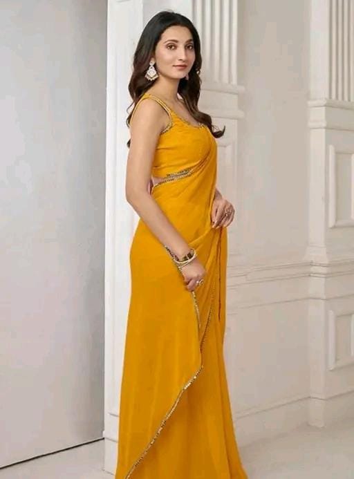 Women stylish pink colour plain pure fox georgette fabrics saree