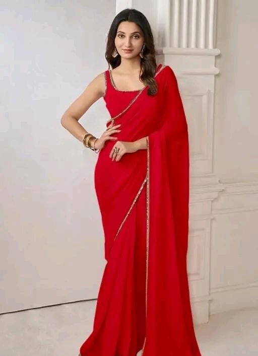 Women stylish pink colour plain pure fox georgette fabrics saree