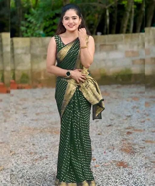 Designer jacquard saree with golden zari blouse